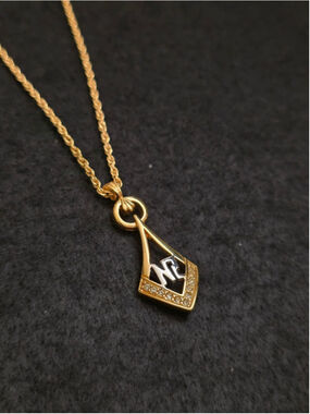 Vintage 80s Nina Ricci Two-Tone "NR" Crystal Halo Necklace